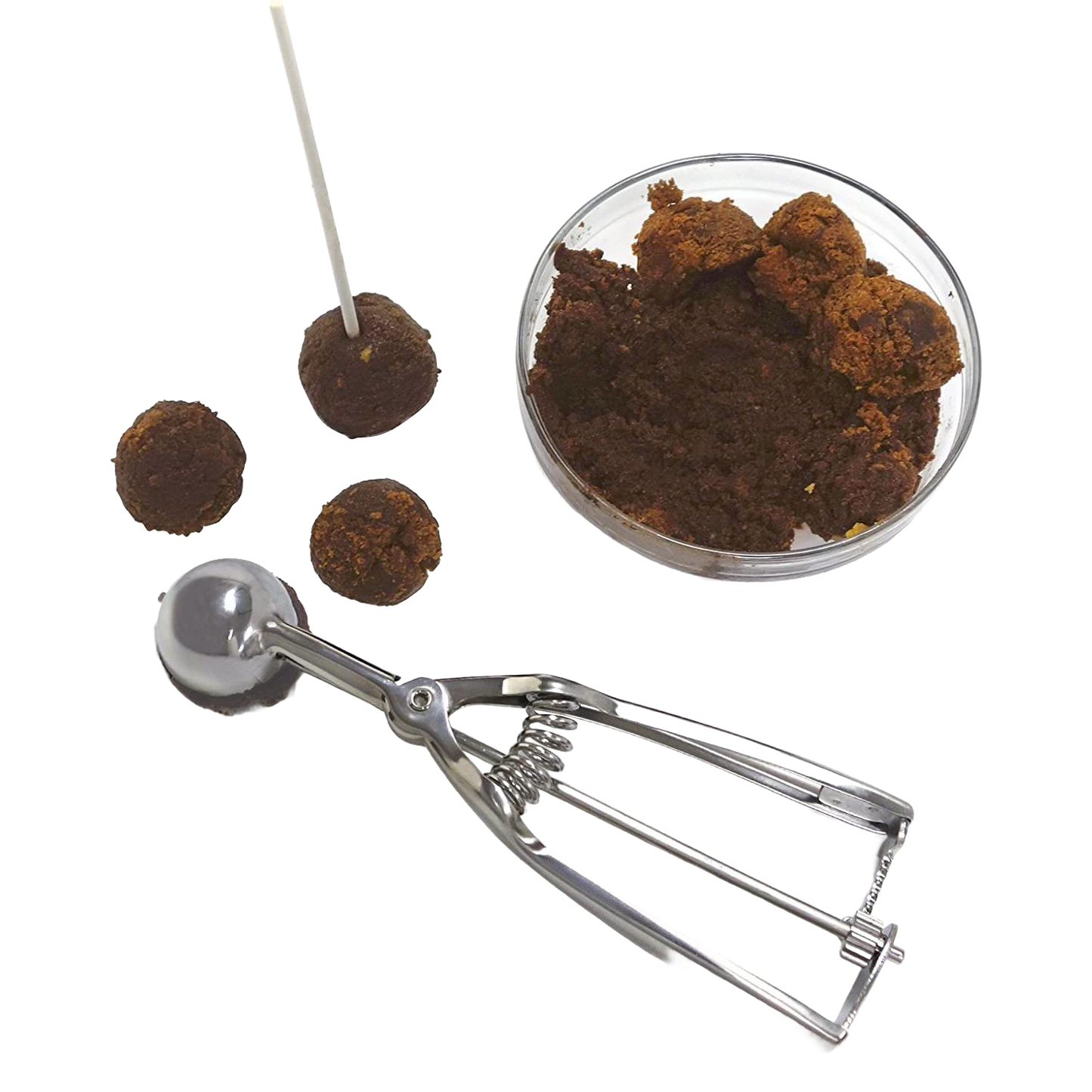 Handcrafted metal scoop with spring release mechanism next to a glass bowl of cookie dough and four uniform dough balls on a white background, ideal for Kitchen & Food, Cookware, Baking Supplies, and Best Sellers collections.