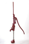 Handcrafted deep well lift pump in red with long handle and metal base, designed for durable yard use, ideal for farm, USA made appliances, water pumps, and deep well collections.