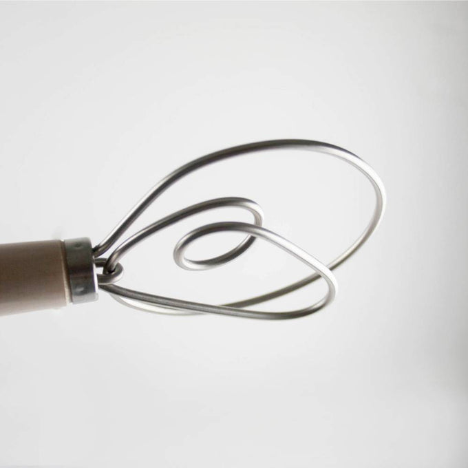Close-up of a handcrafted Old Country Dough Whisk with a smooth wooden handle and two durable spiral metal wires, Amish made in the USA, featured in Kitchen & Food and Baking Supplies collections.
