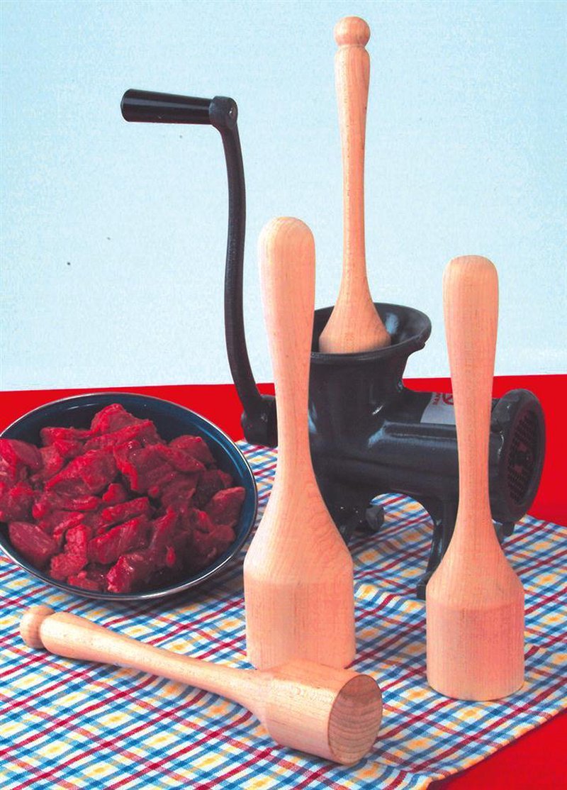 Set of smoothly sanded hardwood wooden stompers beside a vintage-style black metal meat grinder and a bowl of fresh red meat, part of Kitchen & Food, Specialty Equipment, and Amish Made collections.