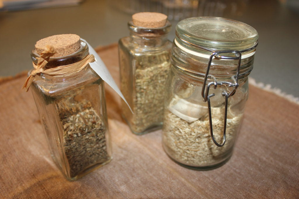 Any clean, dry jar with a tight-fitting lid will do nicely for storing dried herbs.