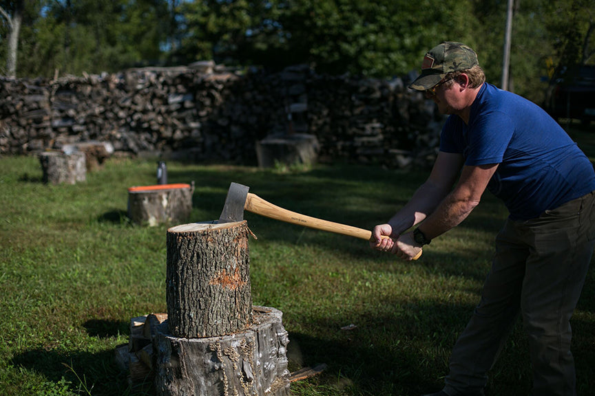 Patrick splitting wood