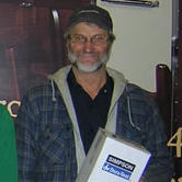 Simon - Our stove installer with the pipe he found