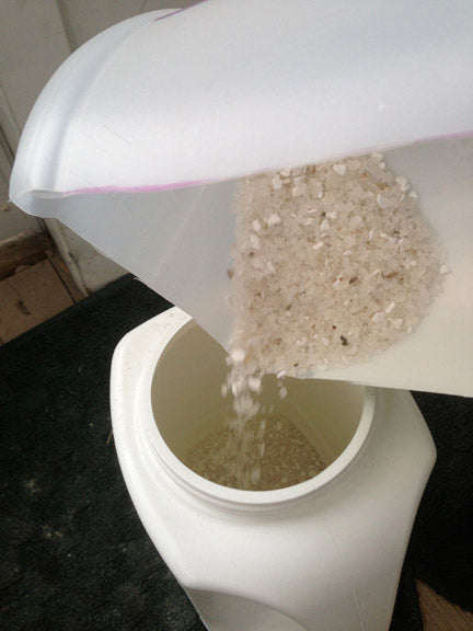 The 'corners' act as mini funnels to transfer material.