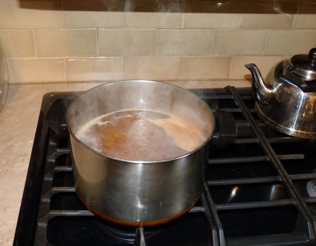 Cooking cider on the stove top.