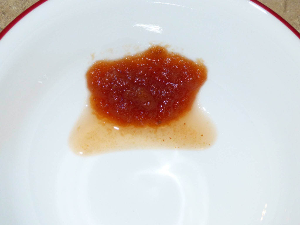 Testing the apple butter: this batch isn't finished yet, too much juice running from it.
