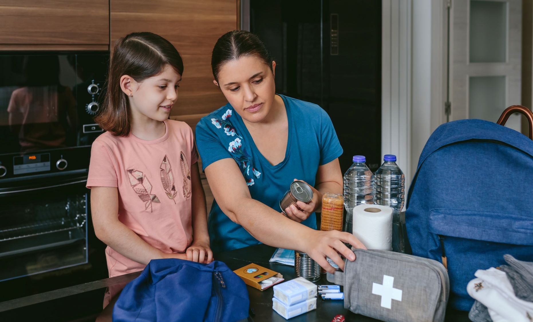 daughter and mother preparing