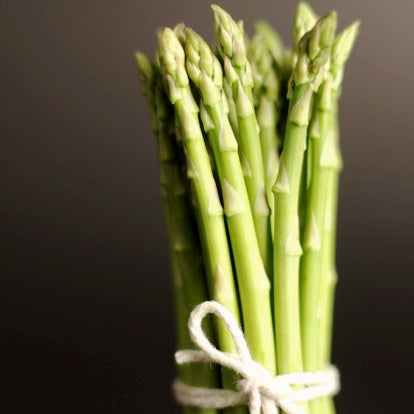 Close-up of bunch of asparagus tied with string