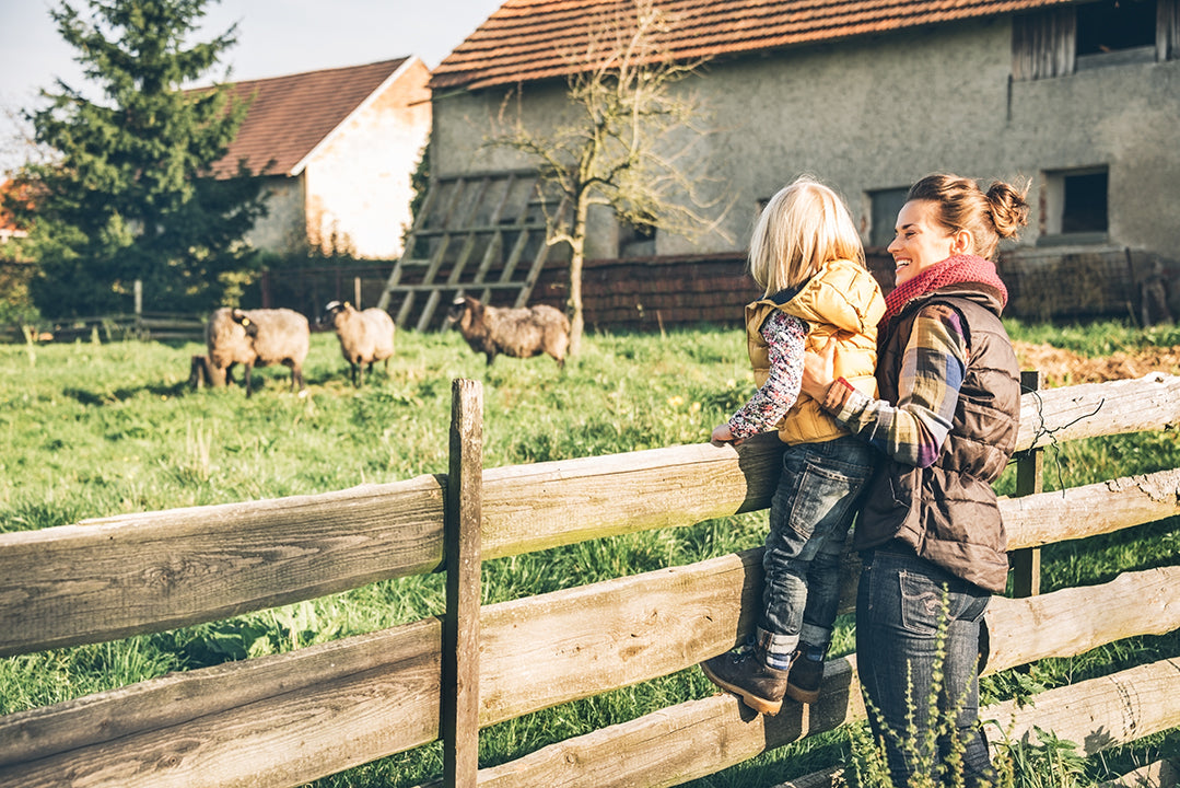 mom and girl on farm