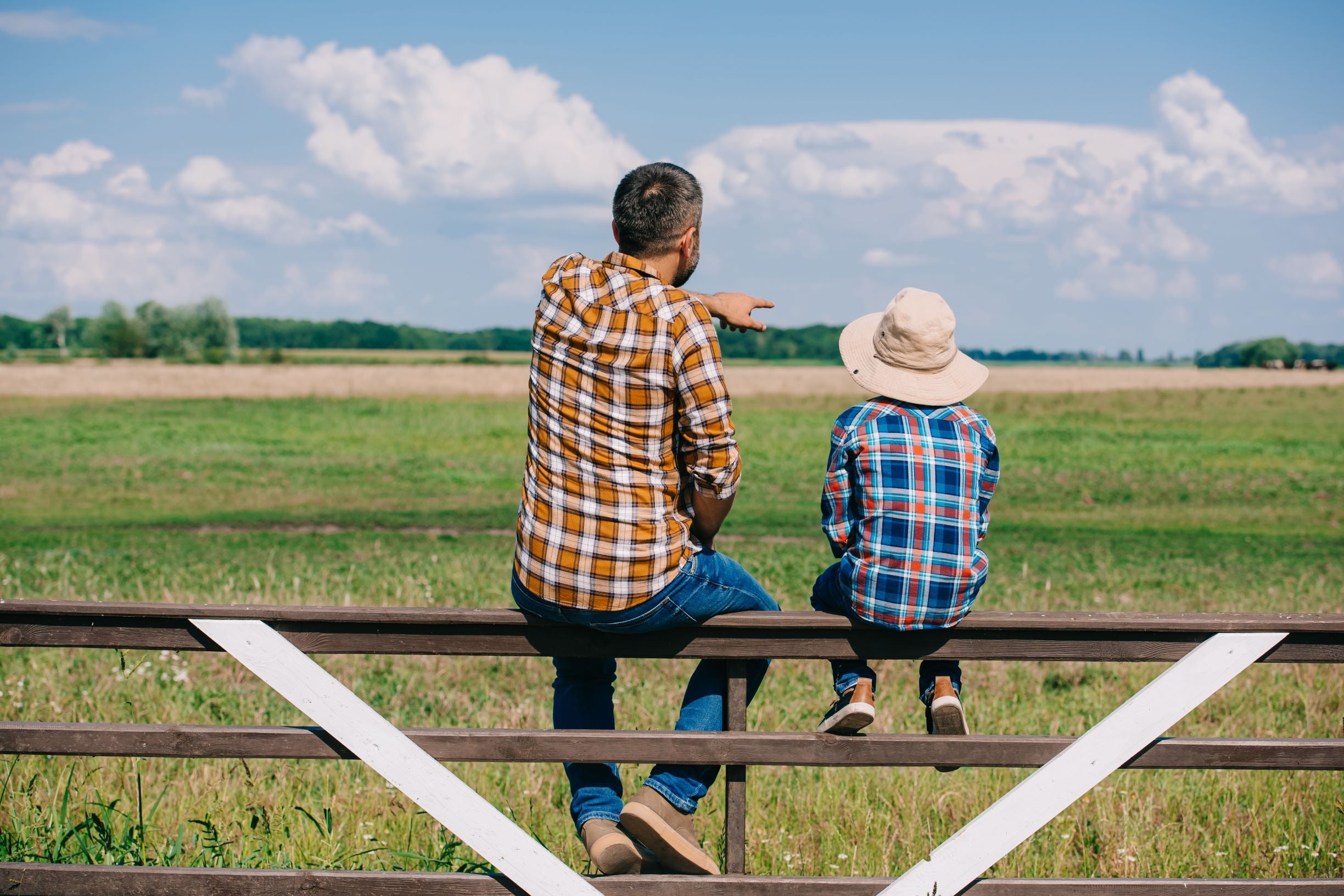 father and son on farm