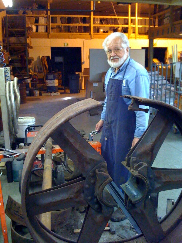 My dad, Jay Lehman, at work restoring antiques for our store display.